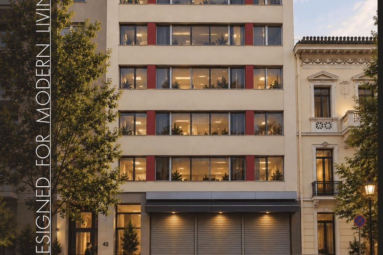 Modern building facade shown at night.
